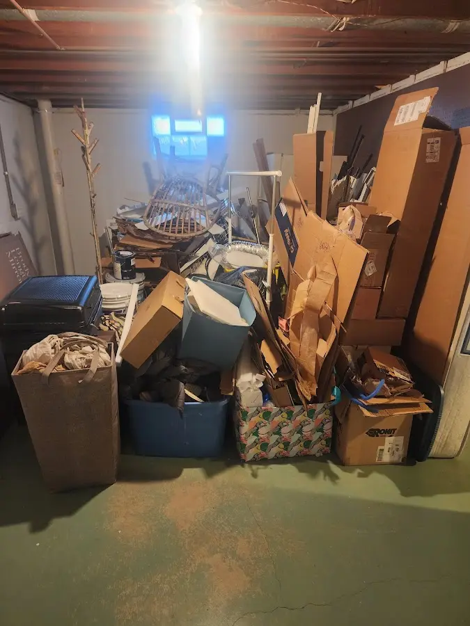 Roll-off dumpster container at job site for Yard Waste Dumpster Rental in Holiday Shores